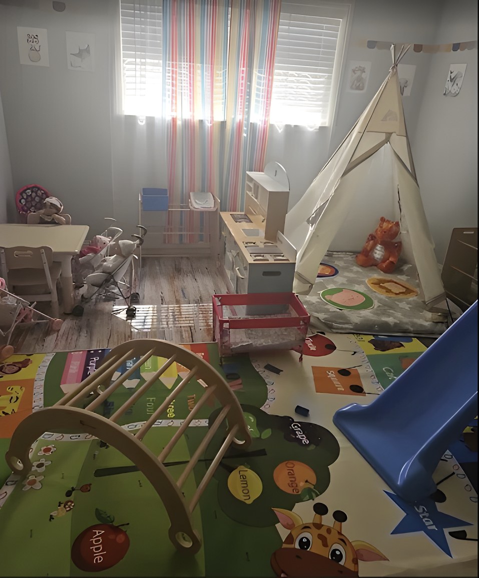 Playroom with tent, play kitchen and toy slide