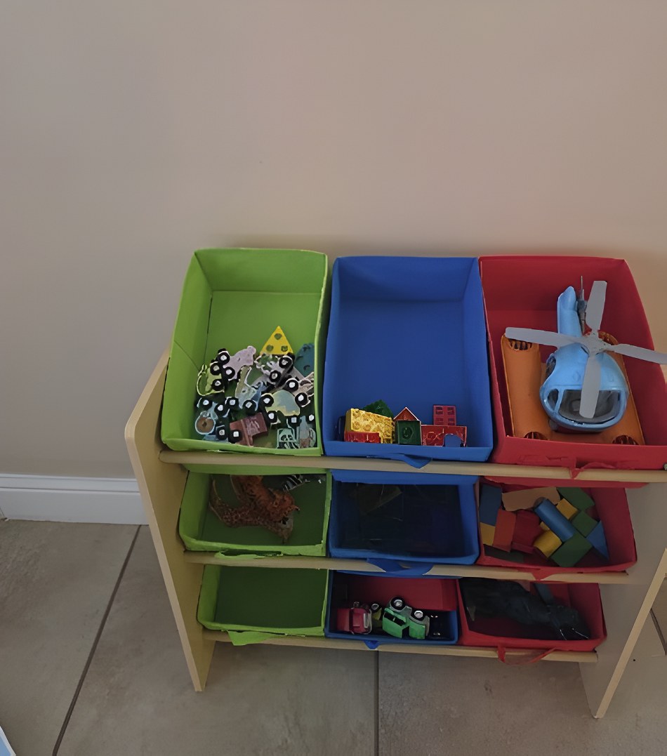 Shelf of colorful toy bins